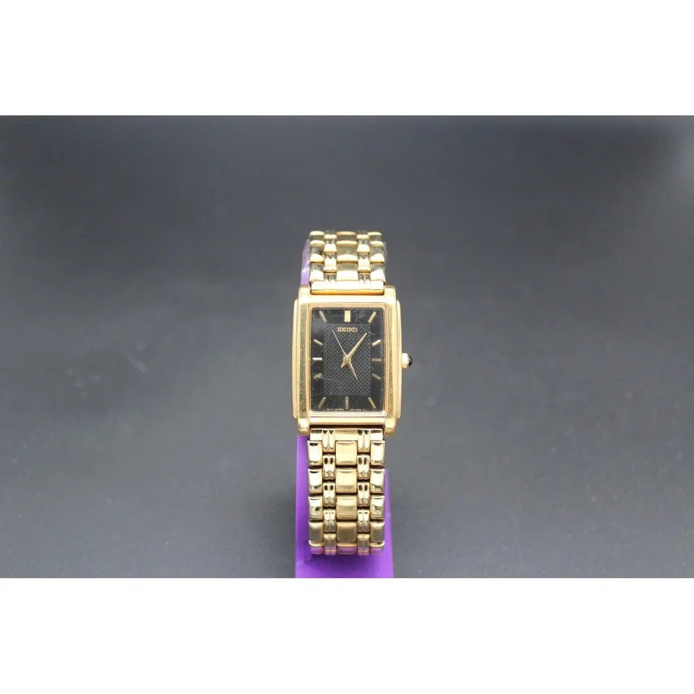 Vintage Seiko V701-5E49 Quartz Tank Watch Black Dial Gold Tone 25mm